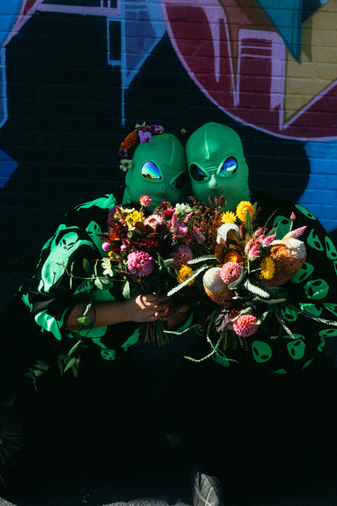 alien couple awkward family love photoshoot green outer space florals