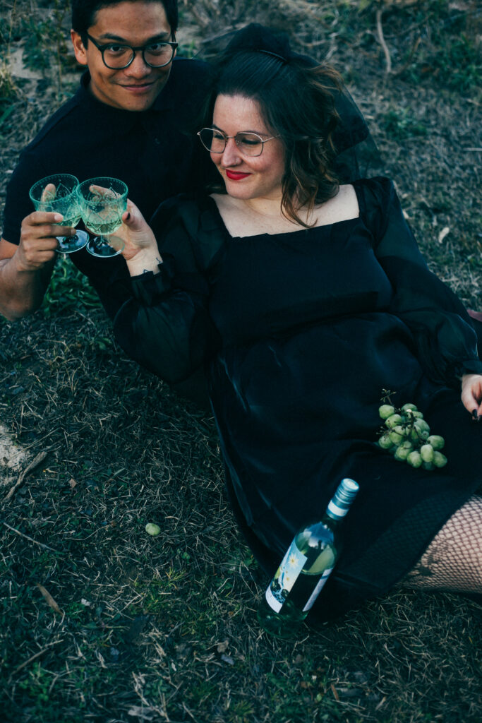 witch red wine dark black engagement photos woods river shoot